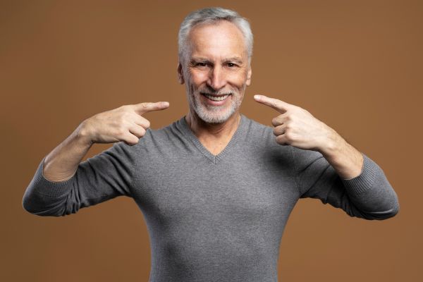 Why Dental Implants Feel More Natural Than Traditional Dentures